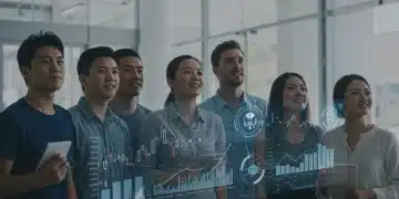 Diverse individuals reviewing federal financial aid information on a digital screen