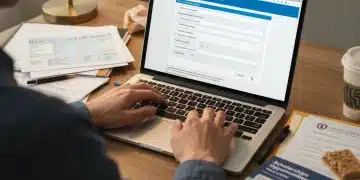 Maximizing 2026 Military Family Education Benefits: A Comprehensive Guide Hands completing FAFSA application on a laptop, surrounded by financial aid documents.