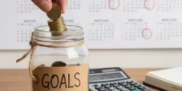 Person saving coins in a jar for short-term financial goals